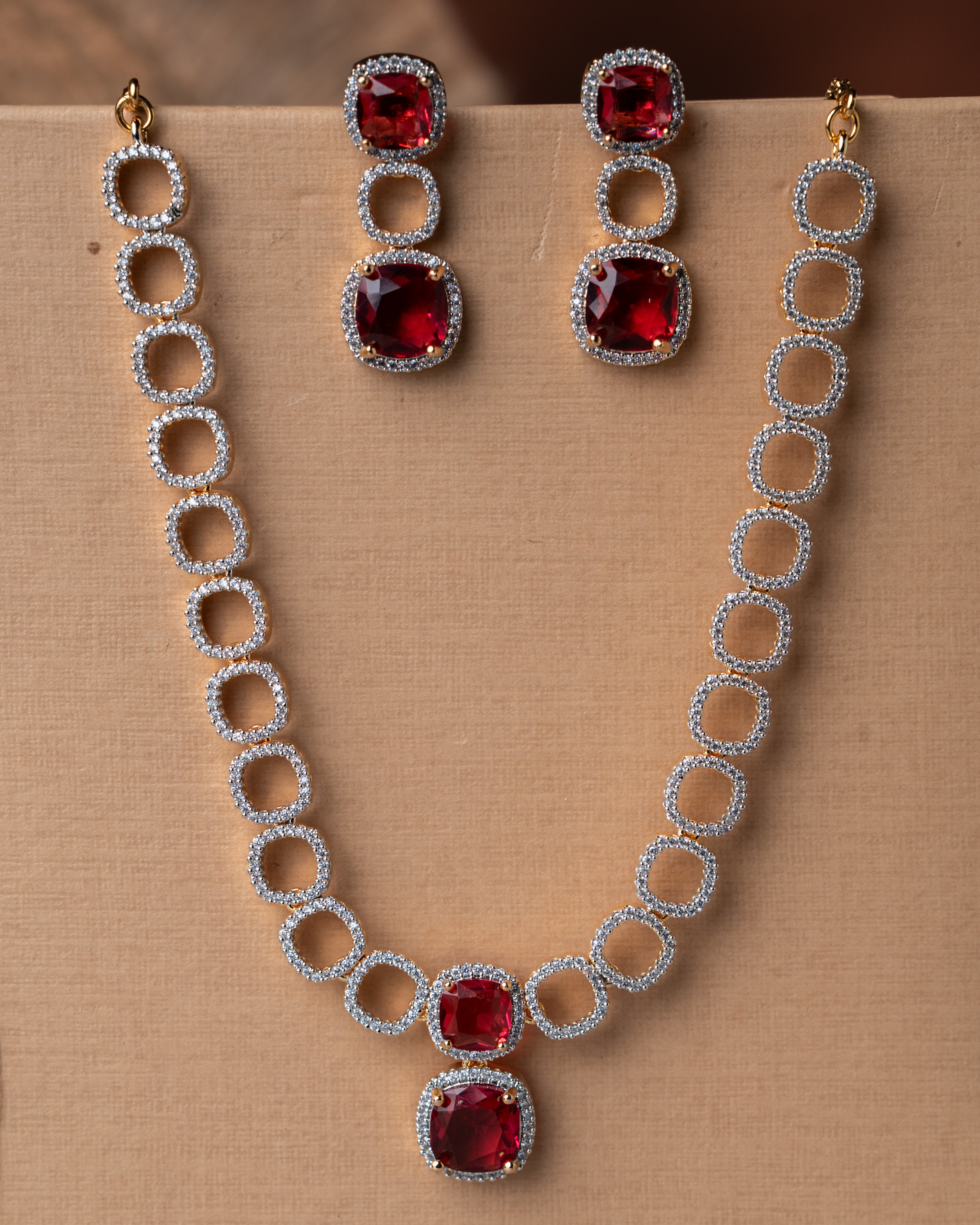 Gold-Toned Ruby and American Diamond (AD) Necklace Set.