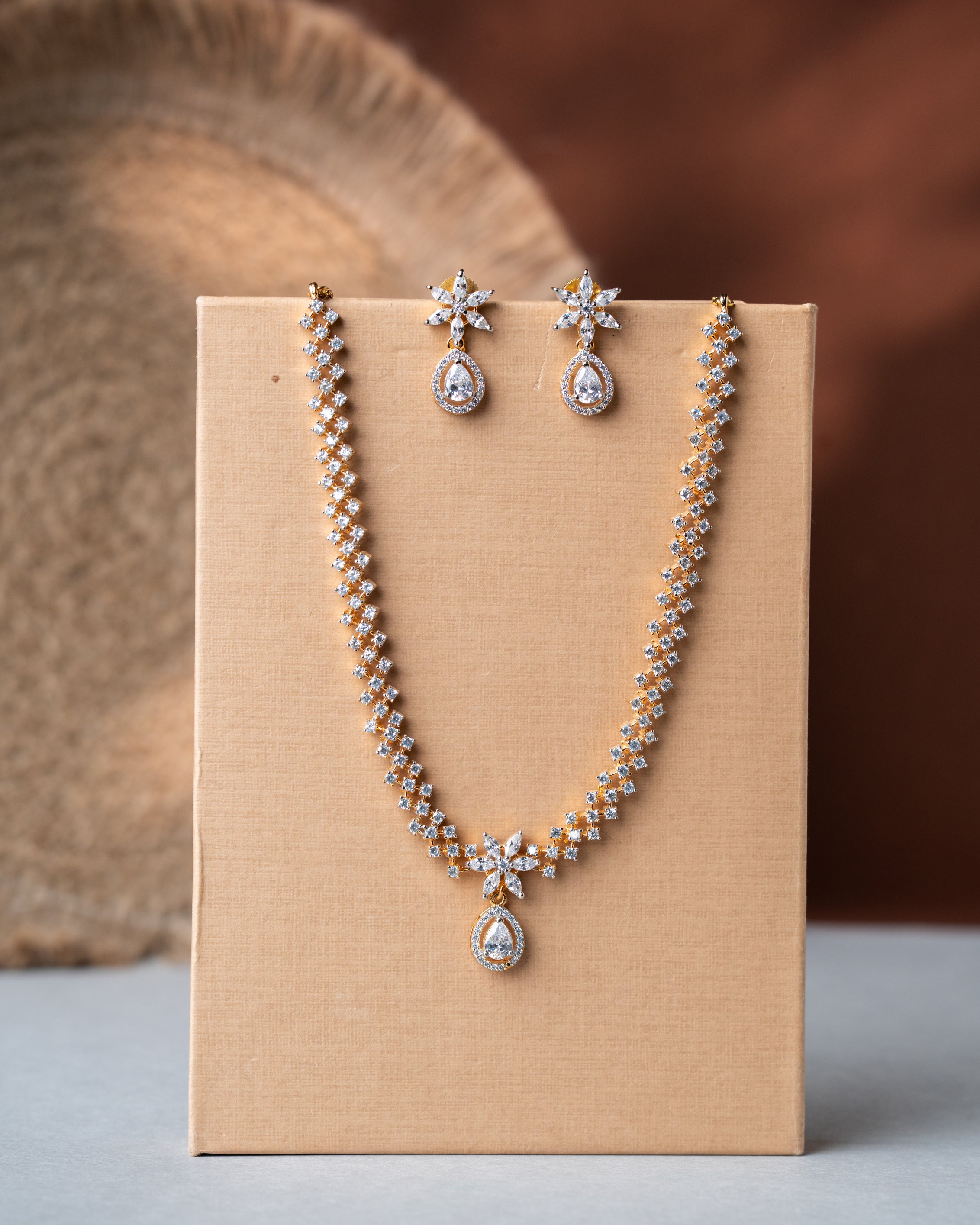 Gold-Toned American Diamond (AD) Star Necklace Set with Solitaire Drop Earrings