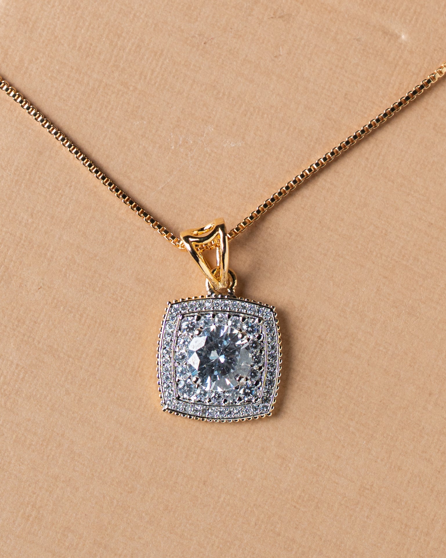 Gold-Toned American Diamond (AD) Halo Solitaire Pendant Set with Studs