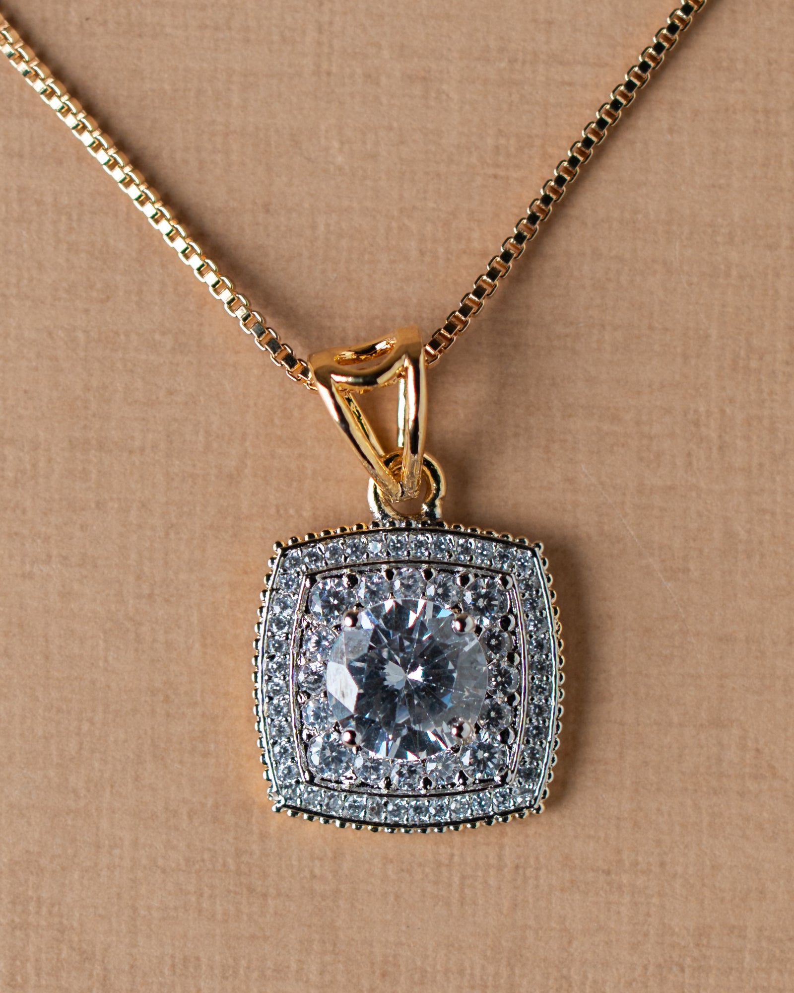 Gold-Toned American Diamond (AD) Halo Solitaire Pendant Set with Studs