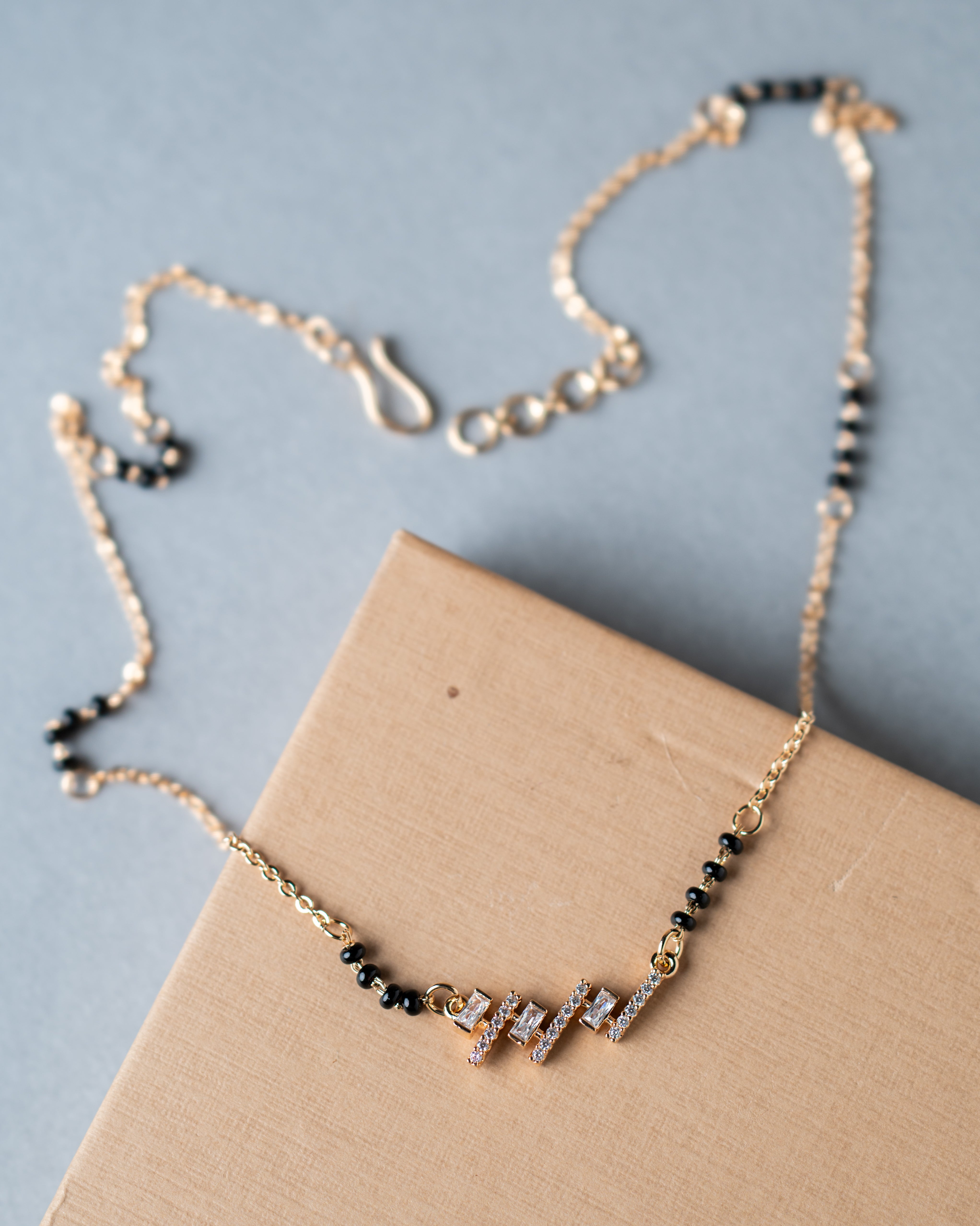 Modern Gold-Toned Zircon Mangalsutra with Geometric Pendant