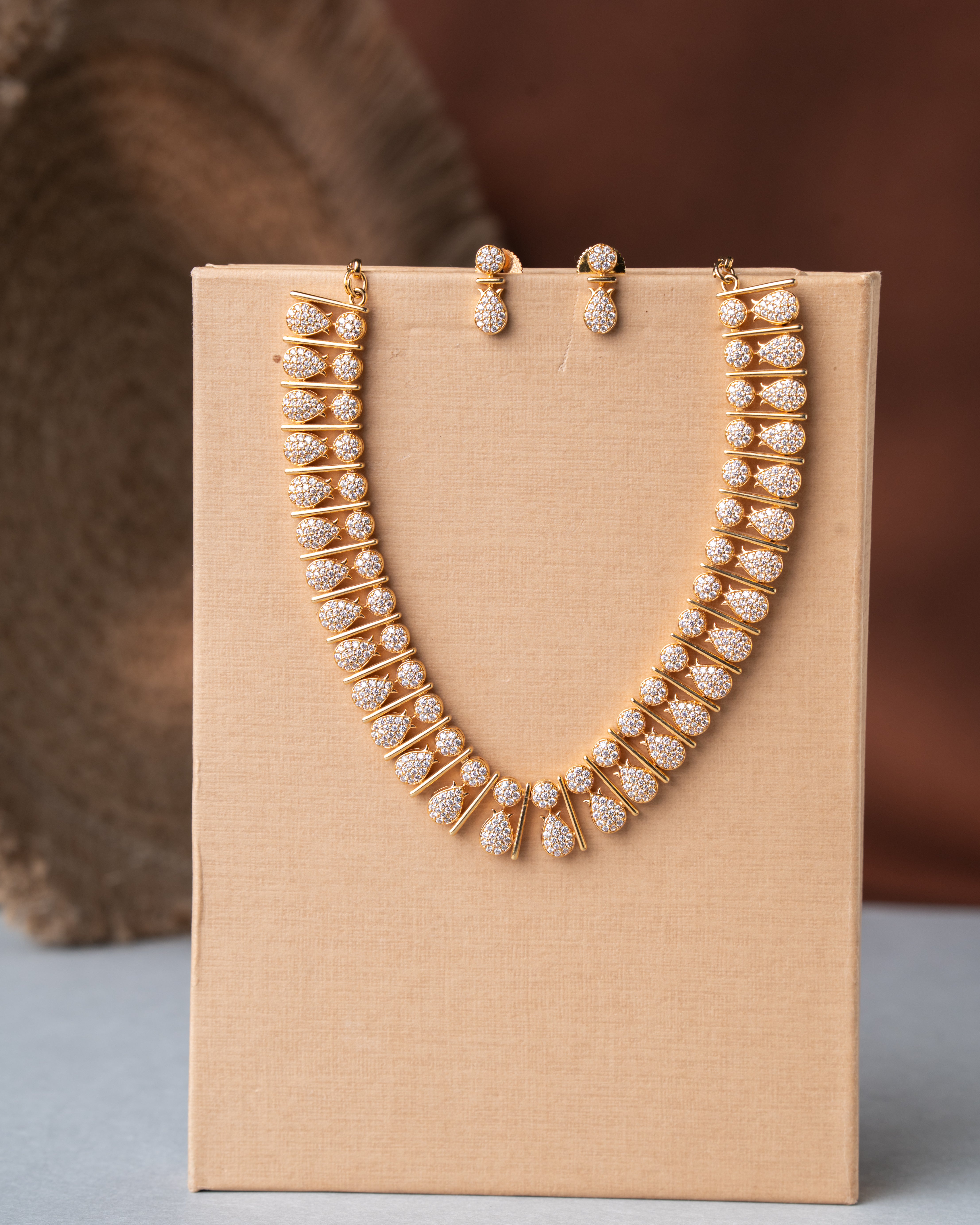 Gold-Toned Starburst Zircon Dangler Necklace Set