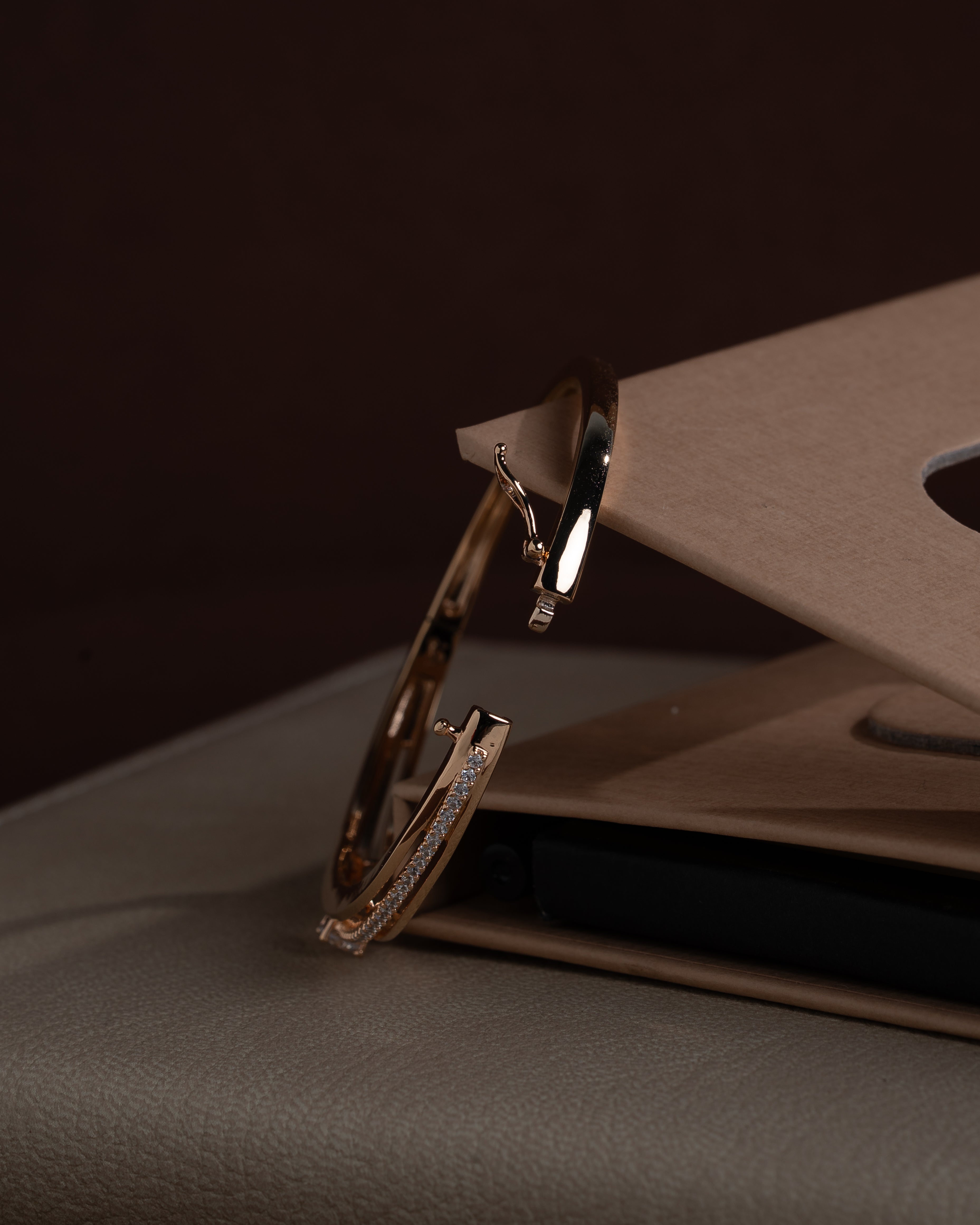 delicate rose gold toned zircon bangle