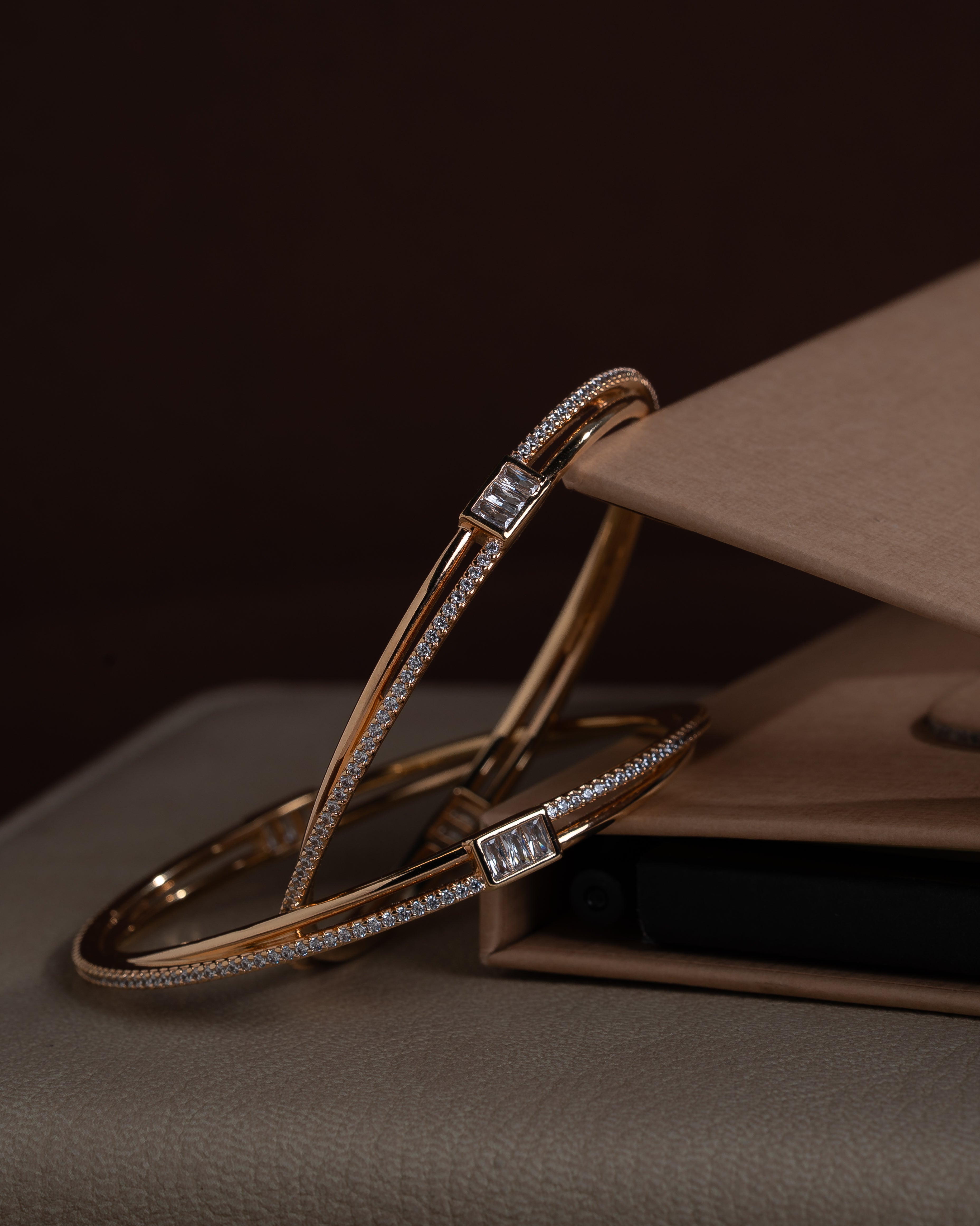 delicate rose gold toned zircon bangle